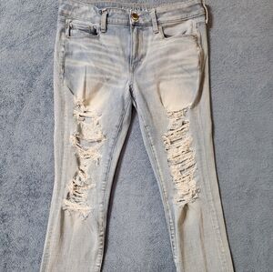 American Eagle Jeans Women's 10 Skinny Super Stretch Distressed Holy Blue Light